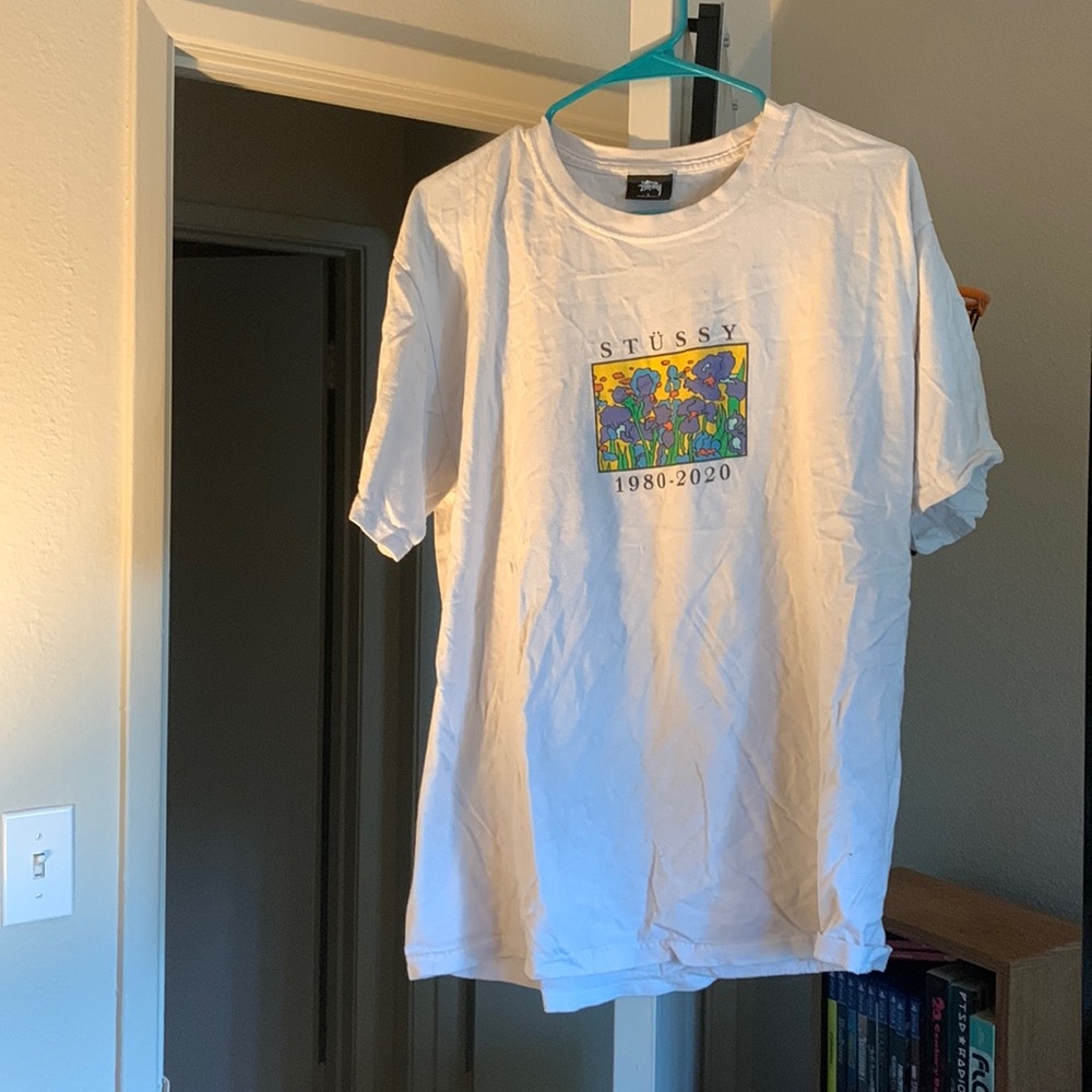 White Stussy shirt with floral design in fair condition